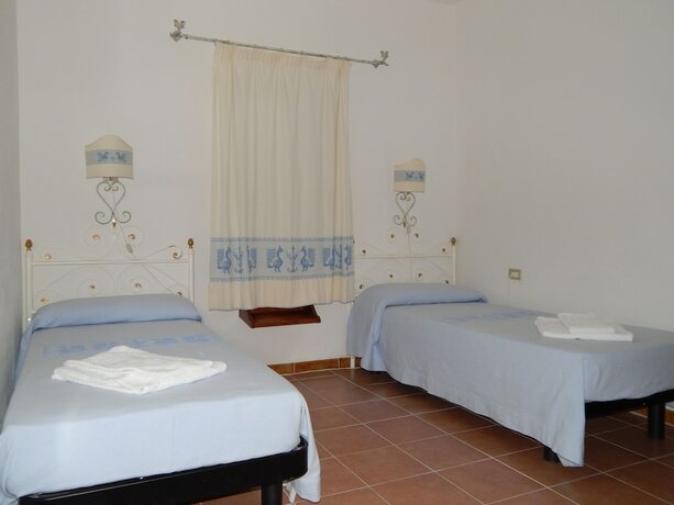 Imagen de la habitación del Hotel Residence Spiaggia Bianca. Foto 18