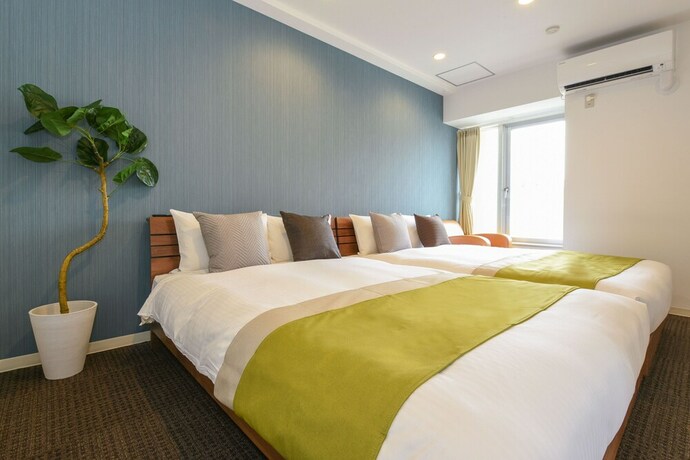 Imagen de la habitación del Hotel Residence Stripe Sapporo. Foto 15
