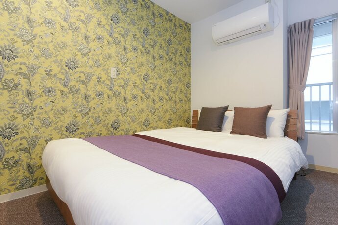 Imagen de la habitación del Hotel Residence Stripe Sapporo. Foto 17