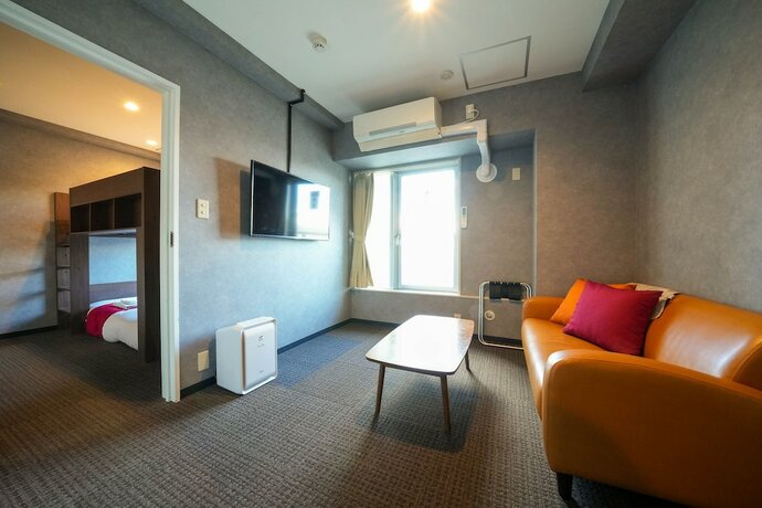 Imagen de la habitación del Hotel Residence Stripe Sapporo. Foto 18