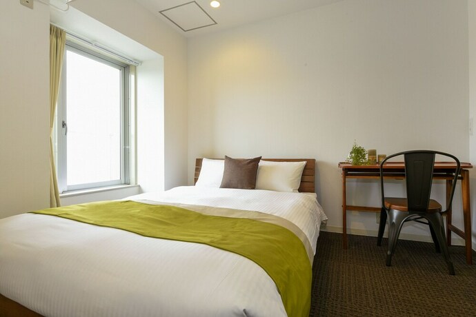 Imagen de la habitación del Hotel Residence Stripe Sapporo. Foto 20