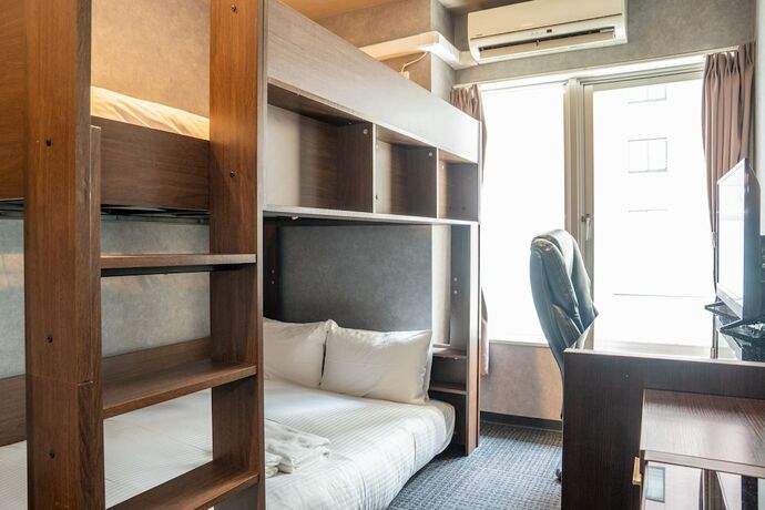 Imagen de la habitación del Hotel Residence Stripe Sapporo. Foto 21