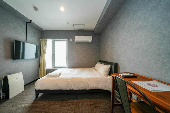 Imagen de la habitación del Hotel Residence Stripe Sapporo. Foto 23