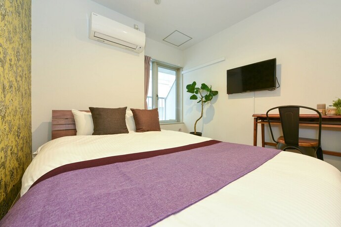 Imagen de la habitación del Hotel Residence Stripe Sapporo. Foto 26