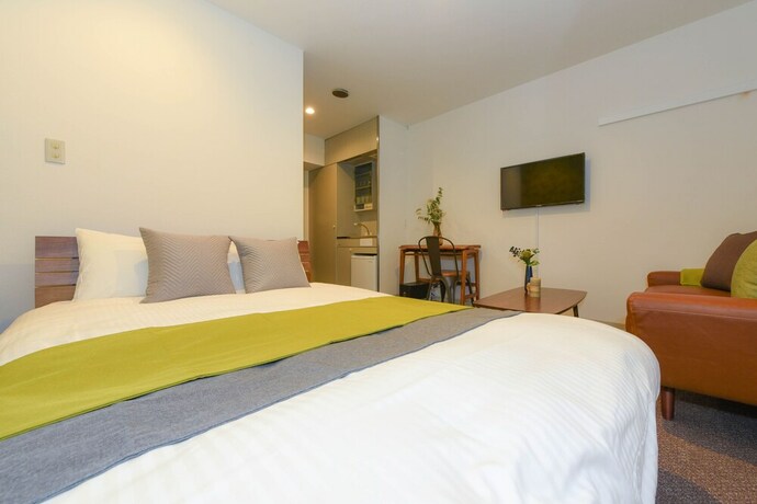 Imagen de la habitación del Hotel Residence Stripe Sapporo. Foto 29
