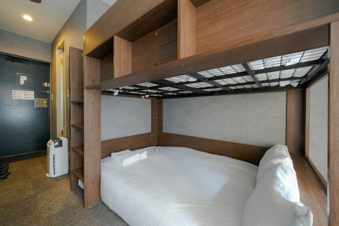Imagen de la habitación del Hotel Residence Stripe Sapporo. Foto 31