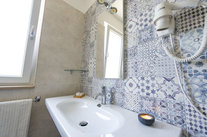 Imagen de la habitación del Hotel Residence Torre del Porto. Foto 14