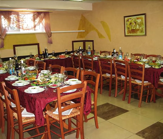 Imagen del bar/restaurante del Hotel Residence Troya. Foto 3