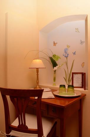 Imagen de la habitación del Hotel Residence Villa La Cappella. Foto 8