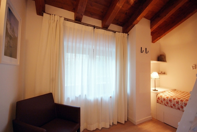 Imagen de la habitación del Hotel Residence Villaggio Delle Alpi. Foto 7