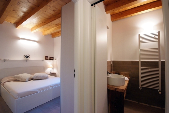 Imagen de la habitación del Hotel Residence Villaggio Delle Alpi. Foto 11