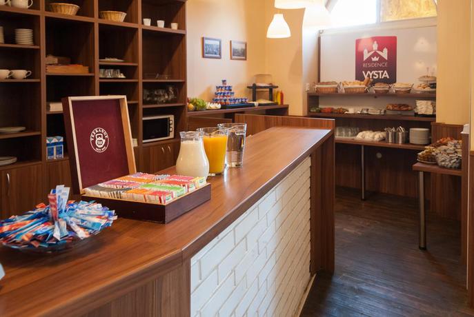 Imagen del bar/restaurante del Hotel Residence Vysta. Foto 4