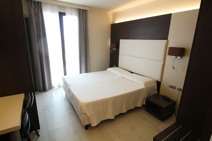 Imagen de la habitación del Hotel Residence del Prado. Foto 18