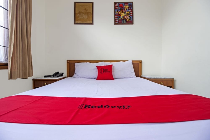 Imagen de la habitación del Hotel Residences by RedDoorz near Rumah Mode. Foto 11