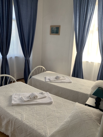 Imagen de la habitación del Hotel Residencia White Love. Foto 6