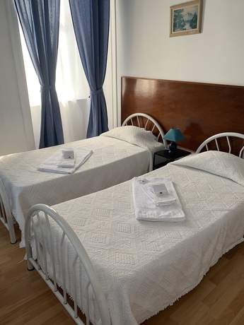 Imagen de la habitación del Hotel Residencia White Love. Foto 7