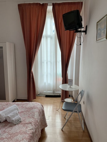 Imagen de la habitación del Hotel Residencia White Love. Foto 9