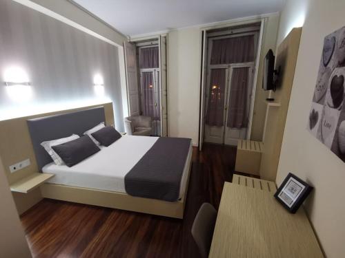 Imagen de la habitación del Hotel Residencial Dora. Foto 19