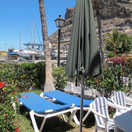 Imagen de los exteriores del Hotel Residencial Puerto Mog&aacute;n. Foto 6