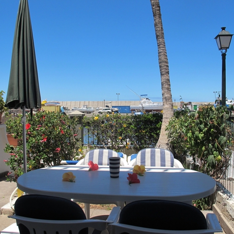 Imagen de los exteriores del Hotel Residencial Puerto Mog&aacute;n. Foto 7