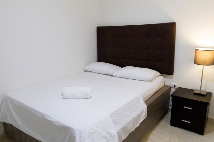 Imagen de la habitación del Hotel Residencias La Che. Foto 2