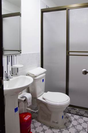 Imagen de la habitación del Hotel Residencias La Che. Foto 12