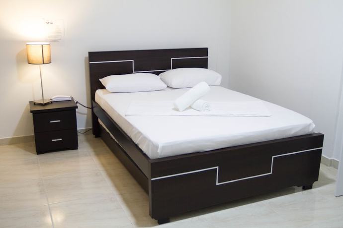 Imagen de la habitación del Hotel Residencias La Che. Foto 15