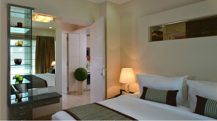 Imagen de la habitación del Hotel Residency Sarovar Portico Mumbai. Foto 11