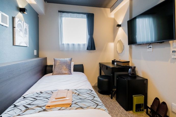 Imagen de la habitación del Hotel Residential Hotel IKIDANE Asakusabashi. Foto 3