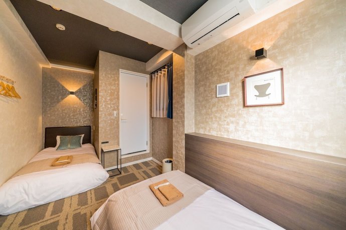 Imagen de la habitación del Hotel Residential Hotel IKIDANE Asakusabashi. Foto 4