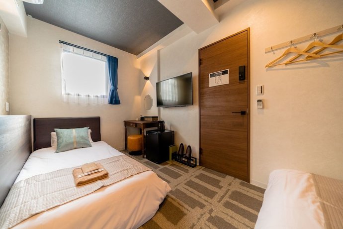Imagen de la habitación del Hotel Residential Hotel IKIDANE Asakusabashi. Foto 5