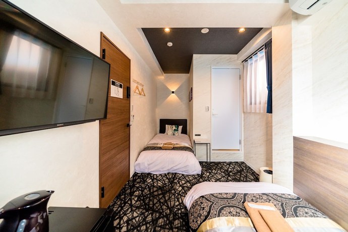 Imagen de la habitación del Hotel Residential Hotel IKIDANE Asakusabashi. Foto 6