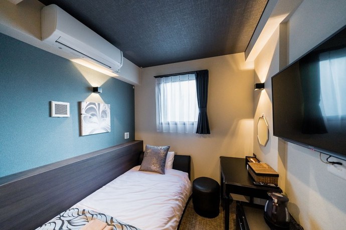 Imagen de la habitación del Hotel Residential Hotel IKIDANE Asakusabashi. Foto 11