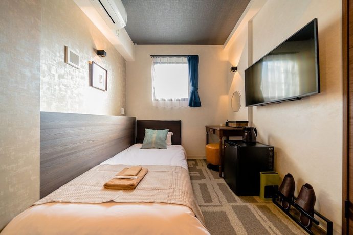Imagen de la habitación del Hotel Residential Hotel IKIDANE Asakusabashi. Foto 13