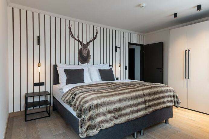 Imagen de la habitación del Hotel Residenz Boutique Suites. Foto 11