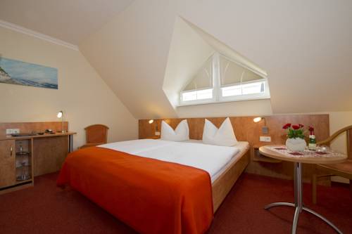 Imagen de la habitación del Hotel Residenz Zum Südstrand. Foto 4