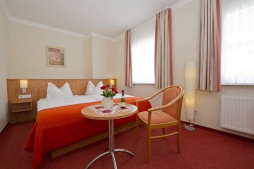 Imagen de la habitación del Hotel Residenz Zum Südstrand. Foto 5