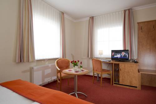 Imagen de la habitación del Hotel Residenz Zum Südstrand. Foto 11