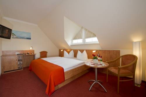 Imagen de la habitación del Hotel Residenz Zum Südstrand. Foto 12