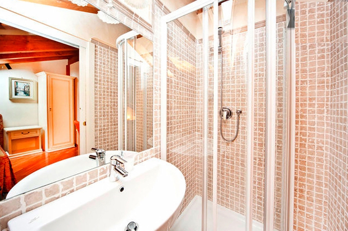 Imagen de la habitación del Hotel Residenza Giardini. Foto 4