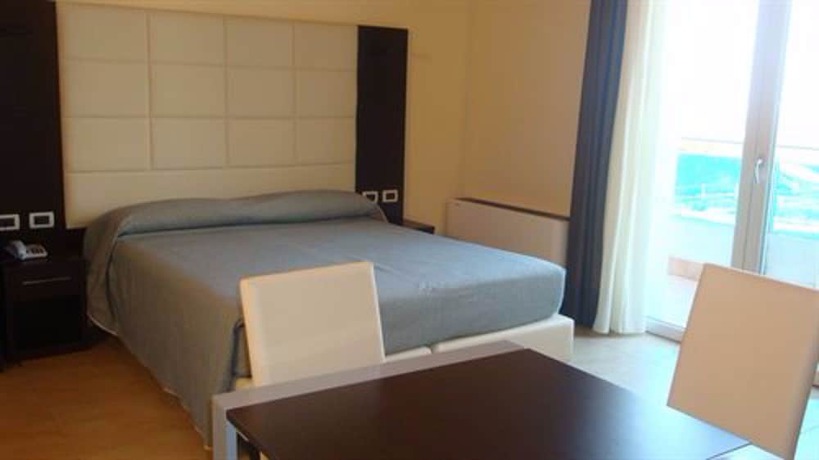 Imagen de la habitación del Hotel Residenza Le Dune. Foto 6