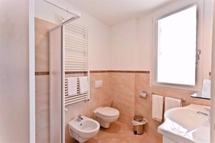 Imagen de la habitación del Hotel Residenza Le Dune. Foto 9