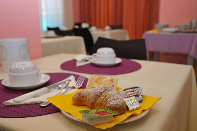 Imagen del bar/restaurante del Hotel Residenza Le Dune. Foto 2