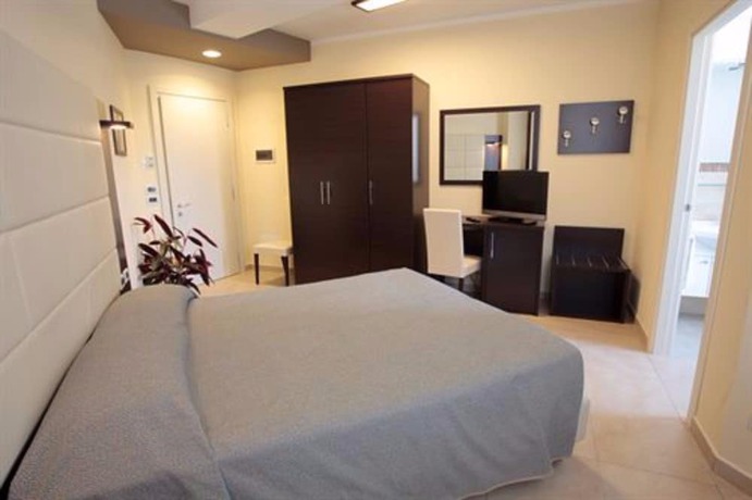 Imagen de la habitación del Hotel Residenza Le Dune. Foto 15