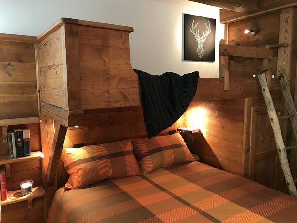 Imagen de la habitación del Hotel Residenza Le Marmotte. Foto 12