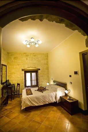 Imagen de la habitación del Hotel Residenza Petra. Foto 7