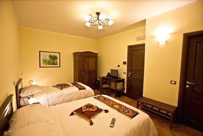 Imagen de la habitación del Hotel Residenza Petra. Foto 9