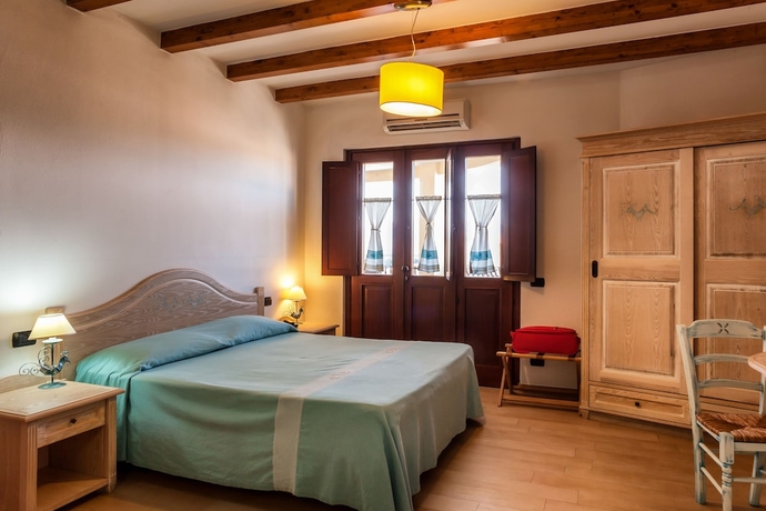 Imagen de la habitación del Hotel Residenza Petrera. Foto 6