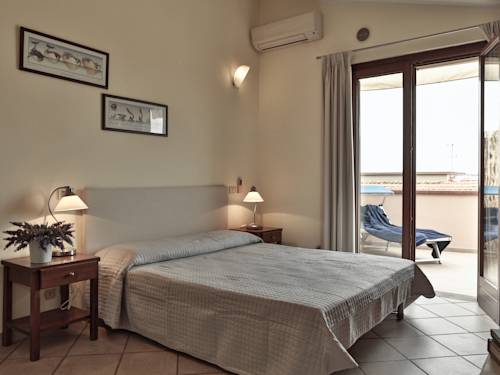 Imagen de la habitación del Hotel Residenza Turistico Alberghiera Corallo. Foto 2
