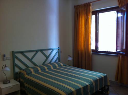 Imagen de la habitación del Hotel Residenza Turistico Alberghiera Corallo. Foto 9